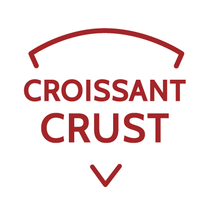 Las palabras "MASA CROISSANT" perfiladas en la forma de una rebanada de pizza.