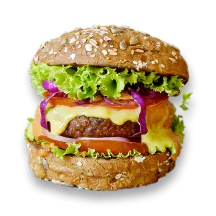 An Awesome burger topped with lettuce, tomato, onion, pickle, and sauce on a whole wheat bun.