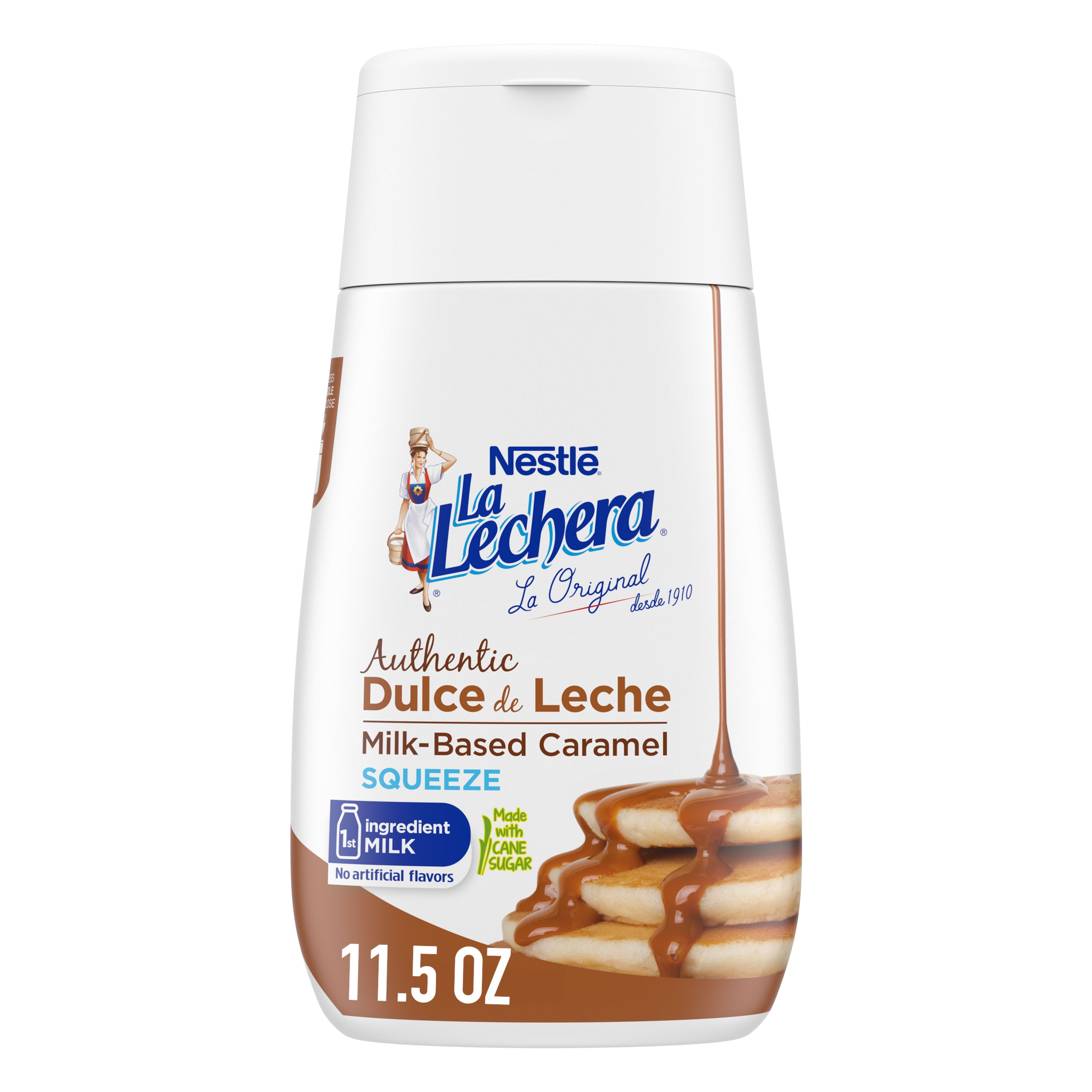 Una botella sirve fácil con tapa con el logo de La Lechera y una pila de pancakes rociados con dulce de leche.