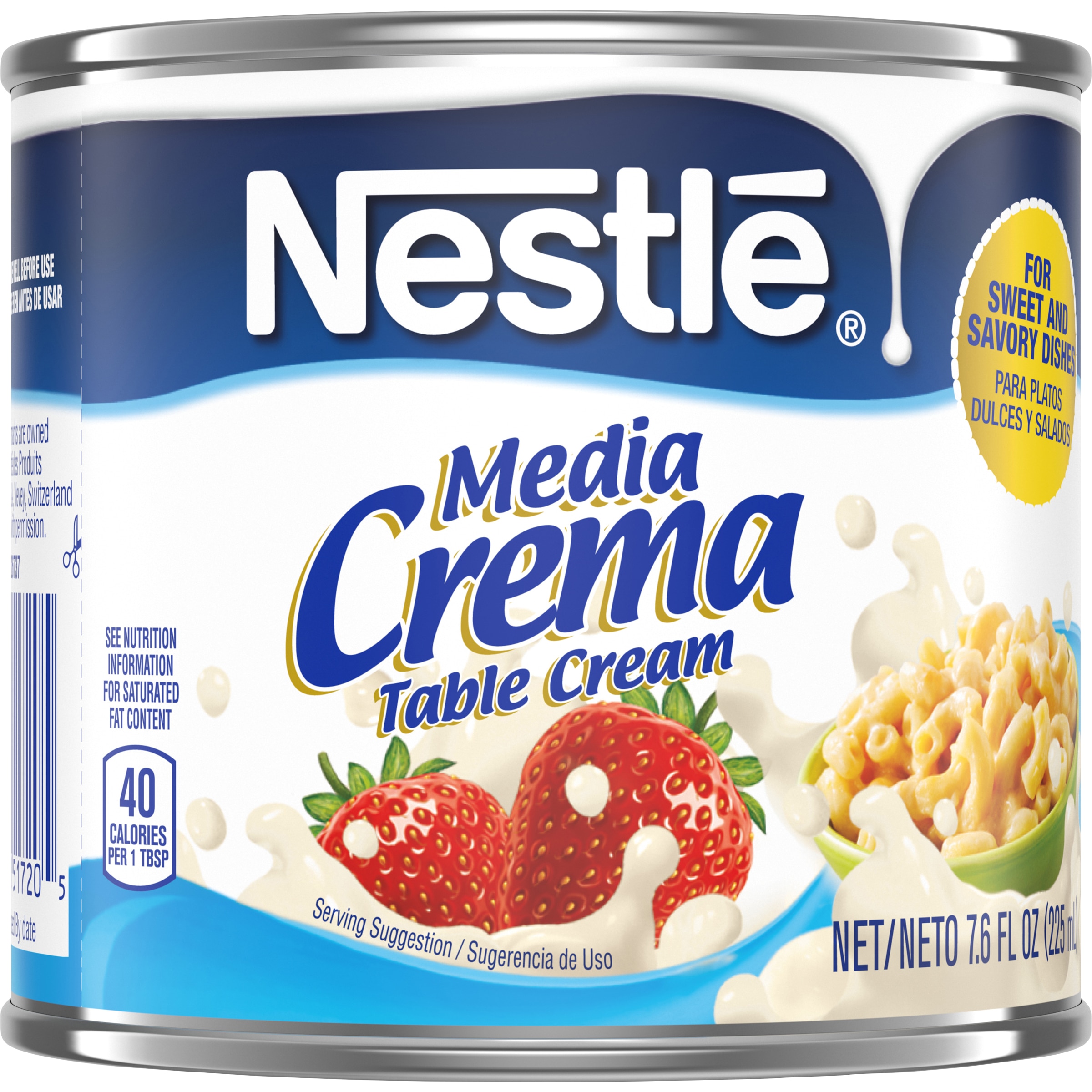 A can of Media Crema table cream with a blue label featuring strawberries, a bowl of macaroni, and cream.