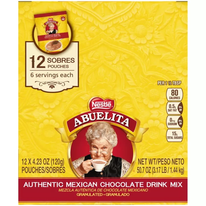 A yellow box with a red label featuring the product name, the Abuelita logo and a "12 Pouches" label.