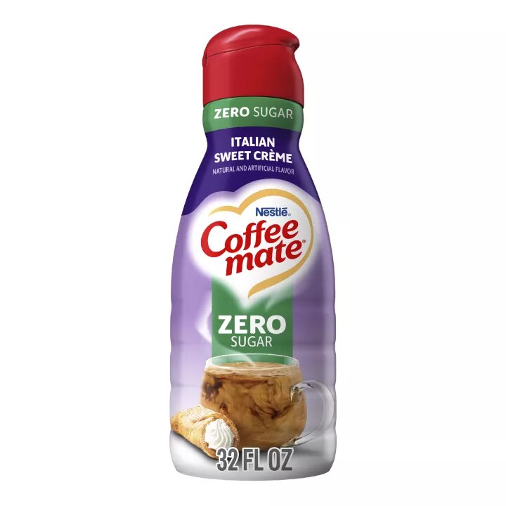 Bottle of Zero Sugar Italian Sweet Crème Coffee Creamer with coffee mug and cannoli and 2x Richer Than Milk label.