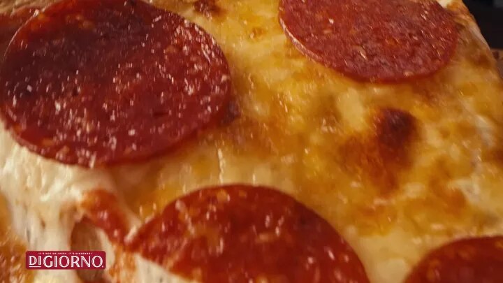 Front Image of a box of DiGiorno Frozen Pizza Hand Toss Three Meat.