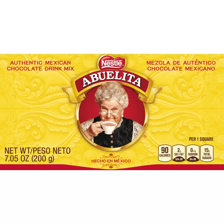 A yellow box with the Abuelita logo, red designs and the words "HECHO EN MÉXICO."