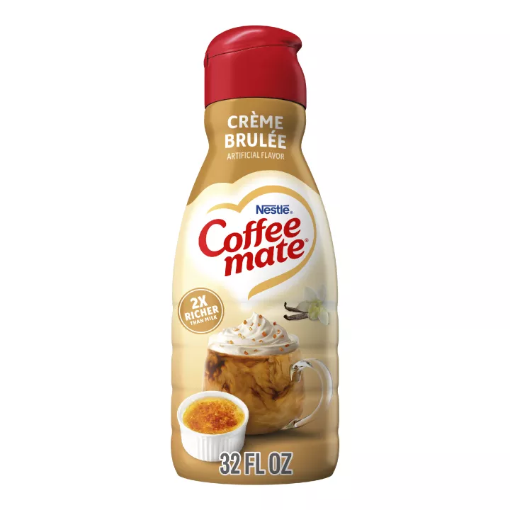 A bottle of Coffee mate Crème Brulee Creamer with a red label and cap above vanilla beans, Crème Brulee and the product logo.