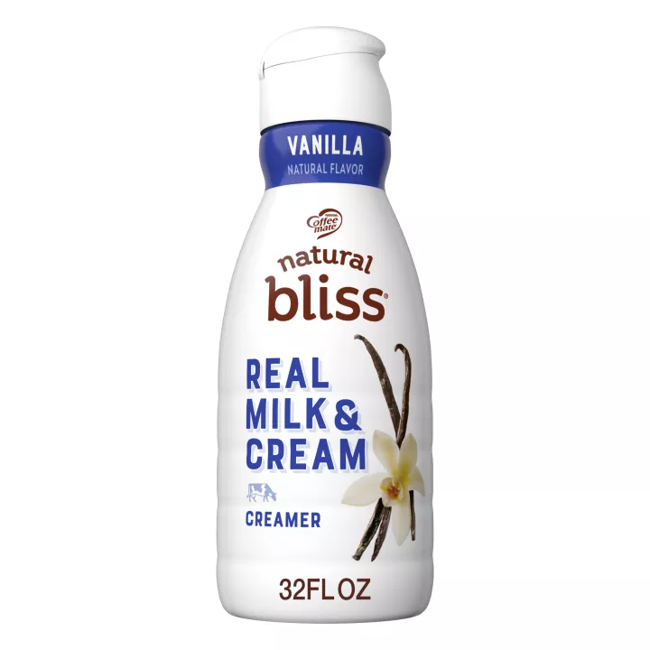 Botella blanca de creamer natural bliss sabor vainilla con etiqueta azul, vainilla y letrero que dice solo 4 ingredientes.
