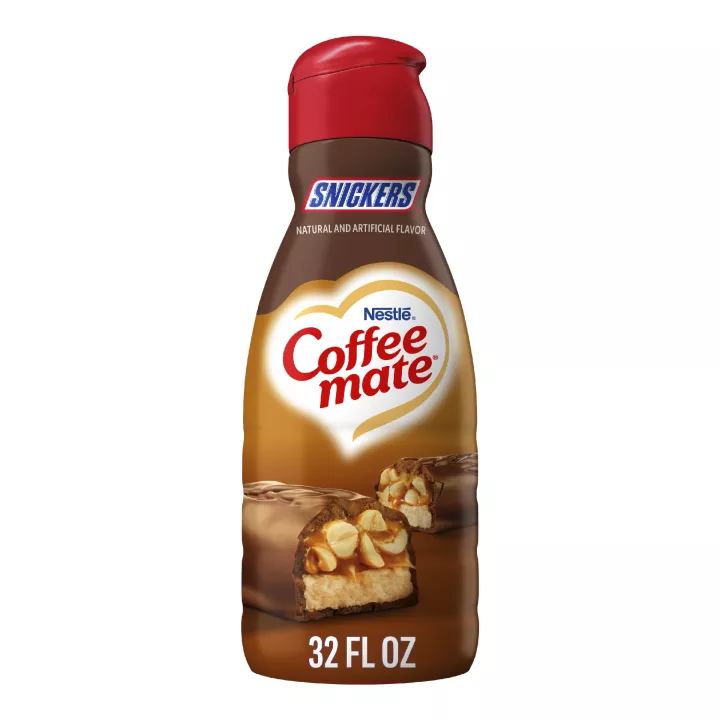 A brown bottle of Snickers Coffee Creamer with a brown label above a Snickers bar and the Coffee mate and Snickers logos.