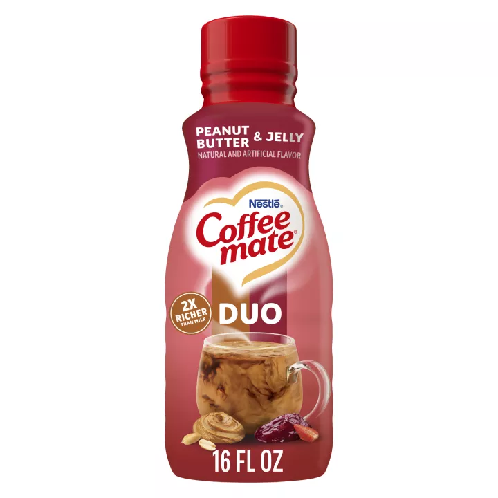 A red bottle with multicolored stripes down the front. The Coffee mate labels sit above an iced coffee and dollops of PB&J.