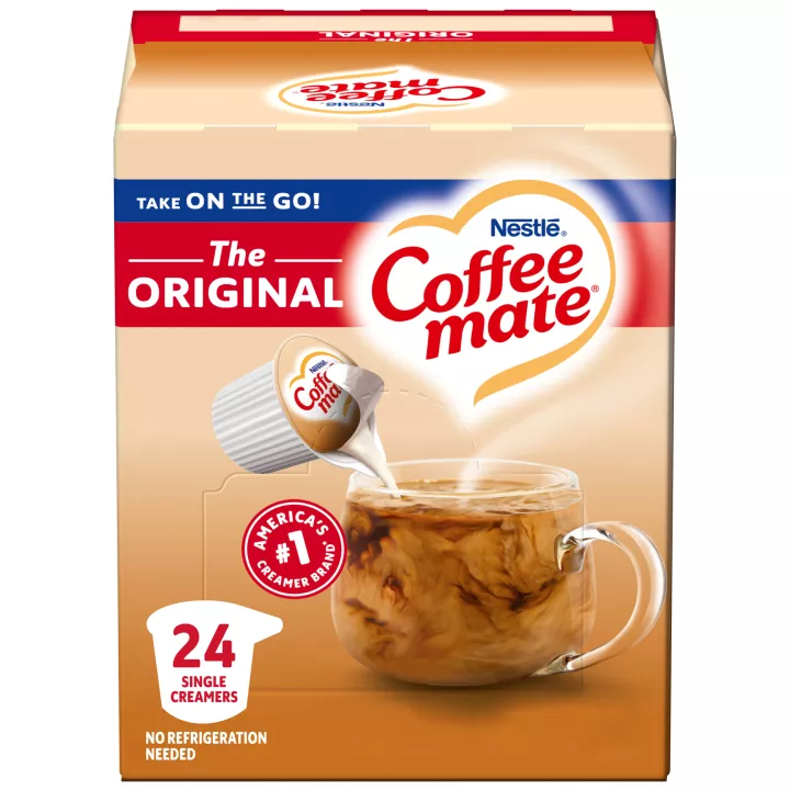 A box of single serve original Coffee mate creamer featuring a red label, coffee mug, biscotti and the Coffee mate logo.
