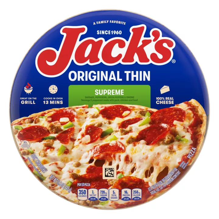 A package of supreme pizza with a green label, a spatula under a pizza, and the Jack's logo on a blue wood background.