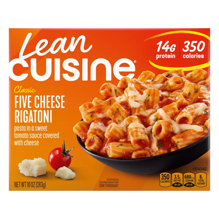 A box of Five Cheese Rigatoni with a Comfort Cravings label near a bowl of rigatoni pasta in a sweet tomato sauce.