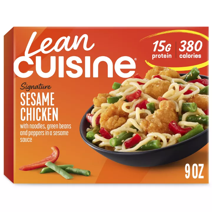 A box of Sesame Chicken with a Protein Kick label near a bowl of chicken, pasta, green beans and peppers.