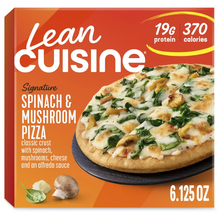 Una caja de pizza de espinacas y hongos con la etiqueta "Especialidad", cerca de pizza de base gruesa con espinacas y hongos.