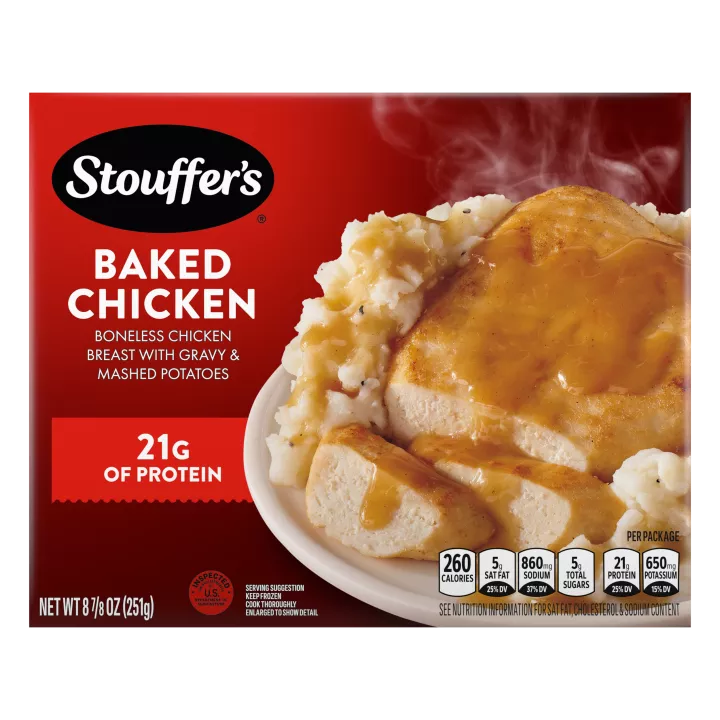 Caja de Baked Chicken con un plato de pollo, puré de papas y salsa gravy debajo del nombre del producto y del logo de STOUFFER'S.