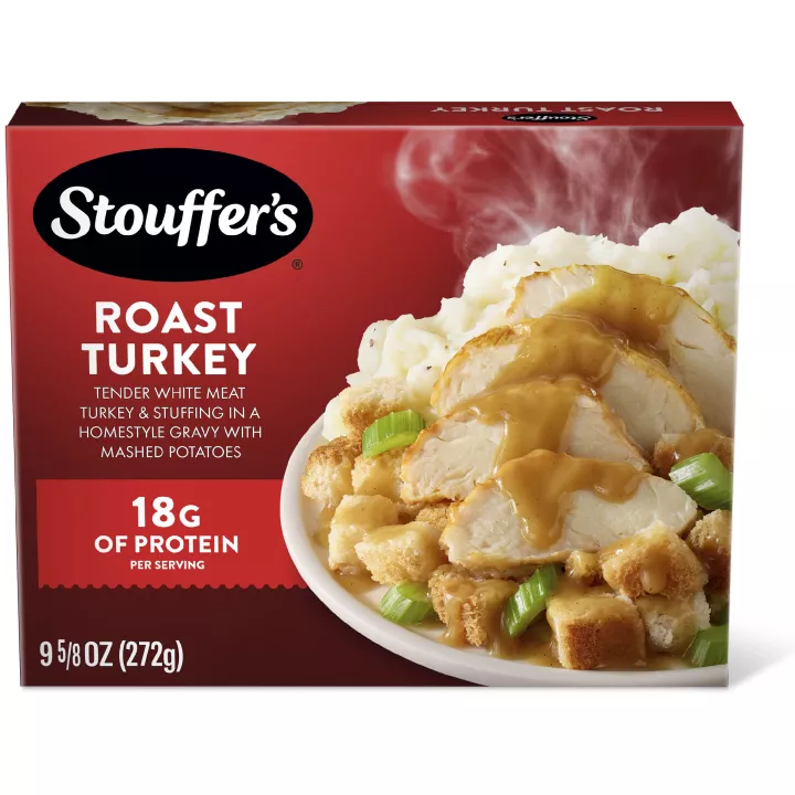 Caja de Roast Turkey con un plato de pavo, relleno y puré de papas debajo del nombre del producto y del logo de STOUFFER'S.