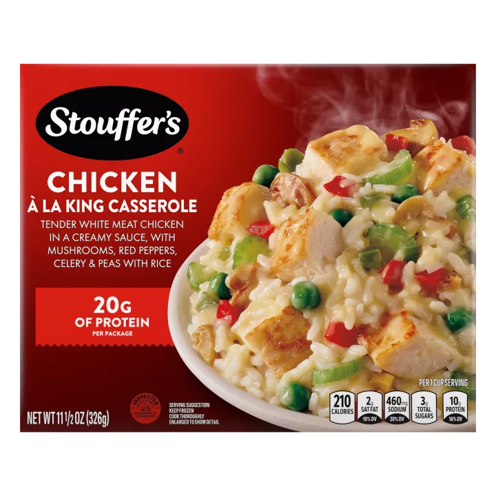 Caja de Chicken à la King con un plato de pollo, verduras y arroz debajo del nombre del producto y el logo de STOUFFER'S.