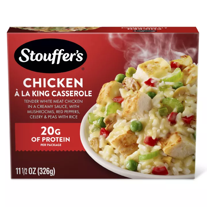 Box of Chicken à la King with a plate of chicken, vegetables and rice below the product name and STOUFFER'S logo.