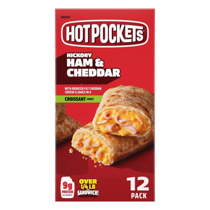 Vista frontal central de sándwiches Hot Pockets Hickory Ham & Cheddar Croissant Crust, paq. 12, PESO NETO 54 oz (3lb 6oz), 1.53 kg.