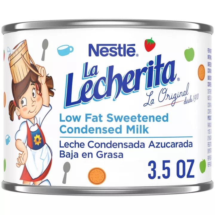 Un paquete de 6 latas de La Lecherita muestra el logo de La Lecherita sobre una lata color blanco con puntos azules y amarillo.