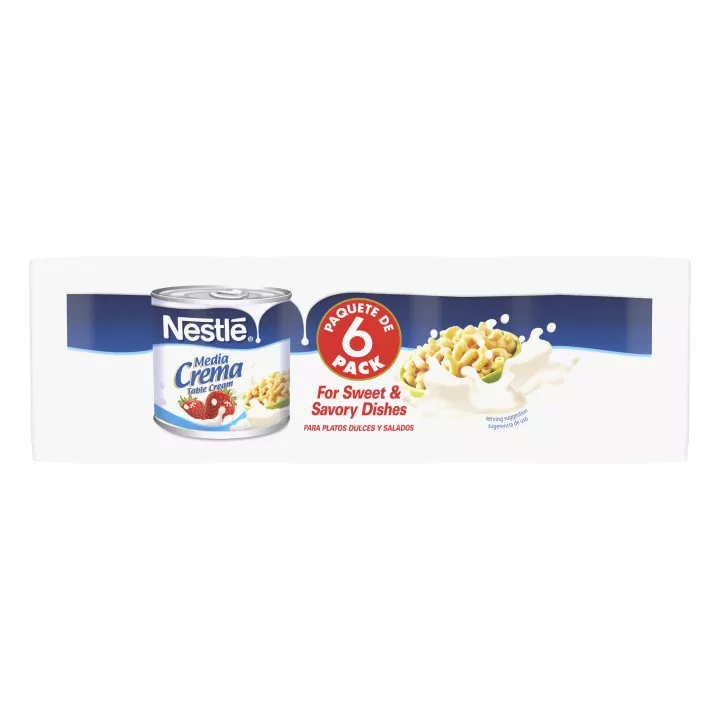 A can of Media Crema table cream with a blue label featuring strawberries, a bowl of macaroni, and cream.