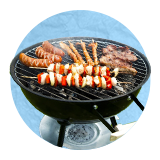 Close up of multiple skewers on top of a round barbecue grill, on a blue background.