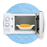 Close up of open white microwave oven with a white dish containing mac and cheese inside of it, on a blue background.