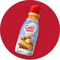 Una botella de creamer Pumpkin Spice en un círculo rojo.