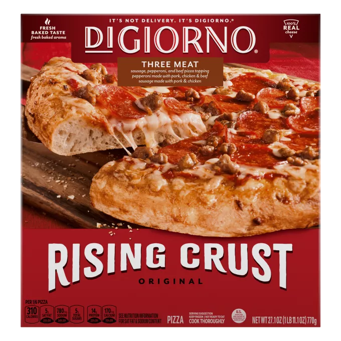 Box of DiGiorno Rising Crust Three Meat pizza with a metal serving spatula and real cheese badge.