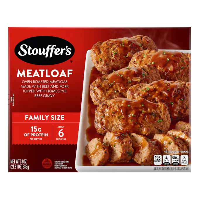 Caja de Meatloaf con un plato y una fuente de pan de carne y salsa espesa junto al nombre del producto, al logo y a una etiqueta que dice "TAMAÑO FAMILIAR".
