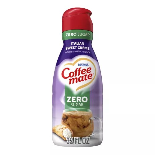 Bottle of Zero Sugar Italian Sweet Crème Coffee Creamer with coffee mug and cannoli and 2x Richer Than Milk label.