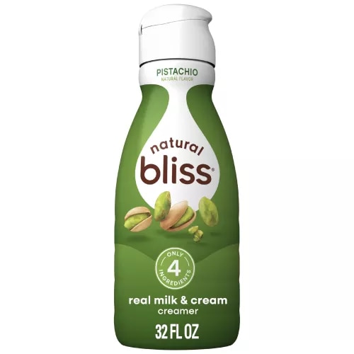 Vista frontal centrada del creamer líquido COFFEE MATE NATURAL BLISS sabor Pistacho de 32 fl oz. Producto en botella.