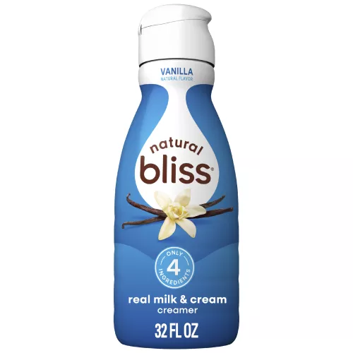 White bottle of natural bliss Vanilla Creamer with a blue label, vanilla beans image and Only 4 Ingredients badge.