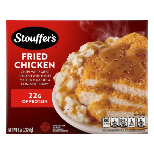 Box of Fried Chicken with a plate of chicken, mashed potatoes and gravy beside the product name and STOUFFER'S logo.