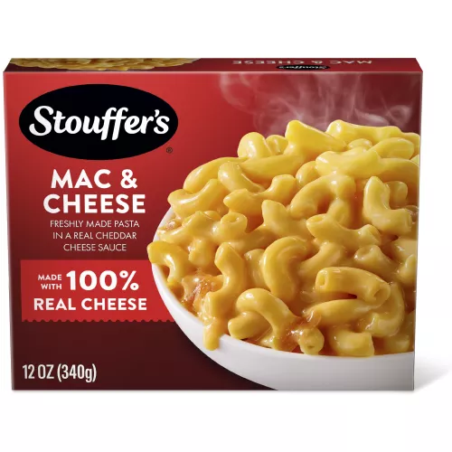 Box of Macaroni & Cheese with a bowl of mac & cheese on a table under the product name and "100% REAL CHEESE" label.
