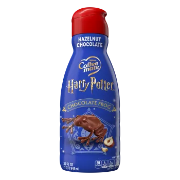 Front Center view of NESTLE COFFEE MATE Liquid Creamer Harry Potter Hazelnut Chocolate Frog 32floz Bottle 32 FL OZ (1 QT) 946 mL product.