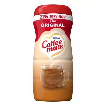 A canister of Coffee mate Original Powder with a red cap and red label above a mug of coffee with biscotti.