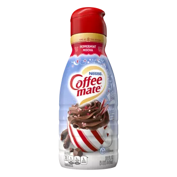 A red bottle of Peppermint Mocha Creamer with a coffee mug, chocolate chunks and peppermint bits under the Coffee mate logo.