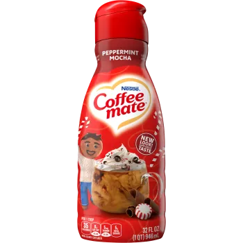 A red bottle of Peppermint Mocha Creamer with a coffee mug, chocolate chunks and peppermint bits under the Coffee mate logo.