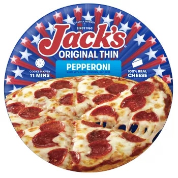 A package of pepperoni pizza with a blue label, a spatula under a pizza, and the Jack's logo on a blue wood background.