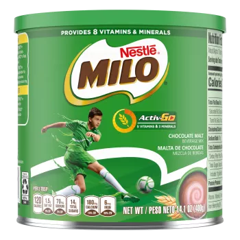 A green container with a green lid and a young boy in a jersey kicking a soccer ball below the product name and benefits.