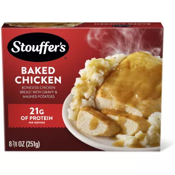 Caja de Baked Chicken con un plato de pollo, puré de papas y salsa gravy debajo del nombre del producto y del logo de STOUFFER'S.