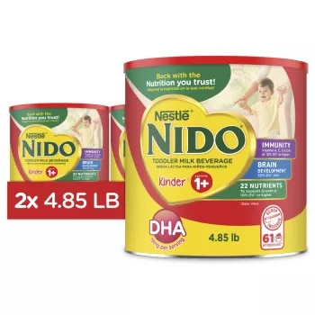 A canister of NIDO 1+ with a red label and a young boy near a badge that reads “immunity, Vitamins A, C, & D, Iron, & Zinc.”
