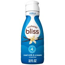 Botella blanca de creamer natural bliss sabor vainilla con etiqueta azul, vainilla y letrero que dice solo 4 ingredientes.