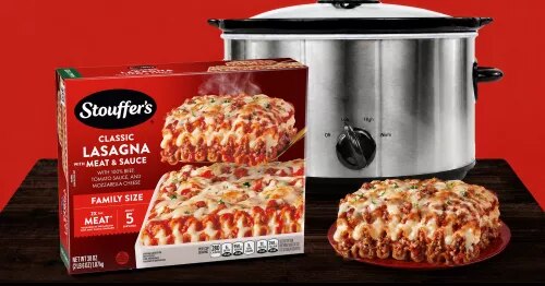 Photograph of two boxed frozen lasagnas, a baked lasagna and stainless slow cooker on red.