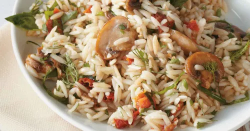RISSOTTO WITH MUSHROOMS, FINE HERBS AND DRIED TOMATOES
