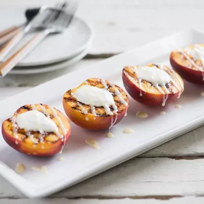 Grilled Peaches with Yogurt and Sweetened Condensed Milk