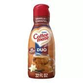Una botella roja de creamer Vanilla Caramel con una taza de café y caramelo derretido debajo del logotipo del producto.