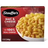 Caja de Macaroni & Cheese con un tazón de macarrones con queso sobre una mesa debajo del nombre del producto y de una etiqueta que dice "Queso 100% auténtico".