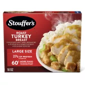 Caja de Roast Turkey Breast con un plato de pavo, relleno y papas debajo del nombre del producto y una etiqueta que dice "27 g de proteína".